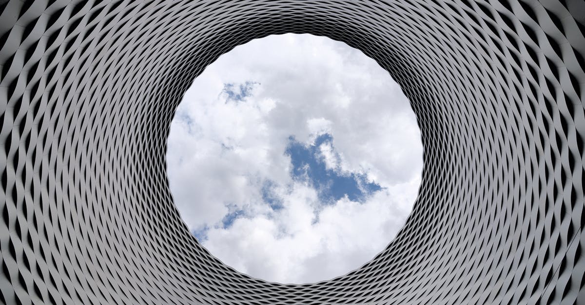 Which city in Burgundy is it on this Samsung ad? - Low-angle Photography of Grey and Black Tunnel Overlooking White Cloudy and Blue Sky