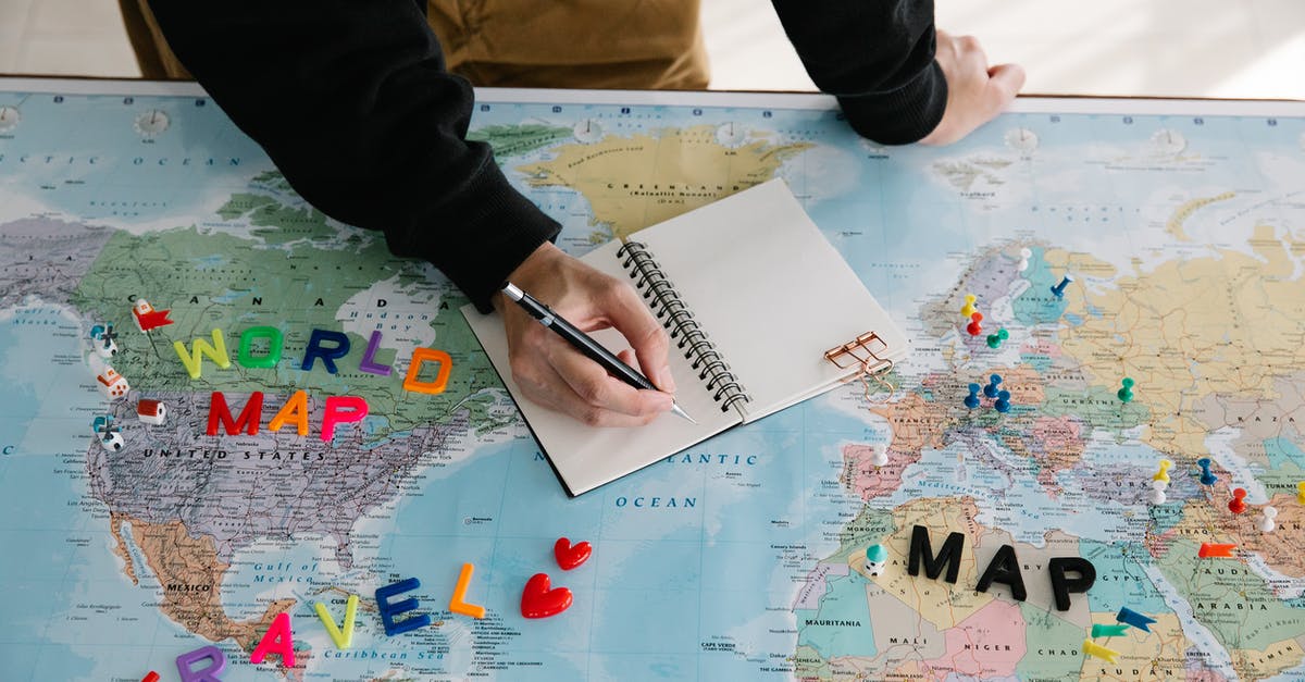 Which countries do not require visas for Brazilian travelers - Person Writing on a Notebook Place on a World Map