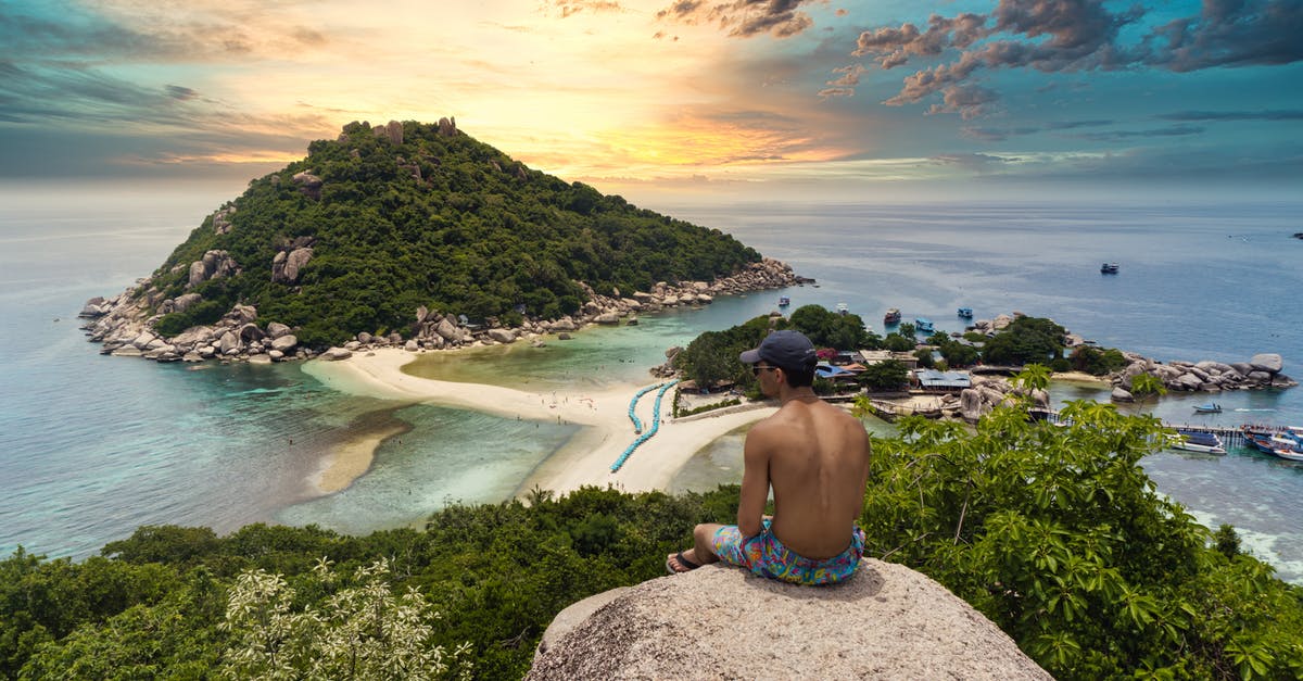 Which countries in Southeast Asia require travel insurance proof? - Shirtless Man Sitting On A Rock