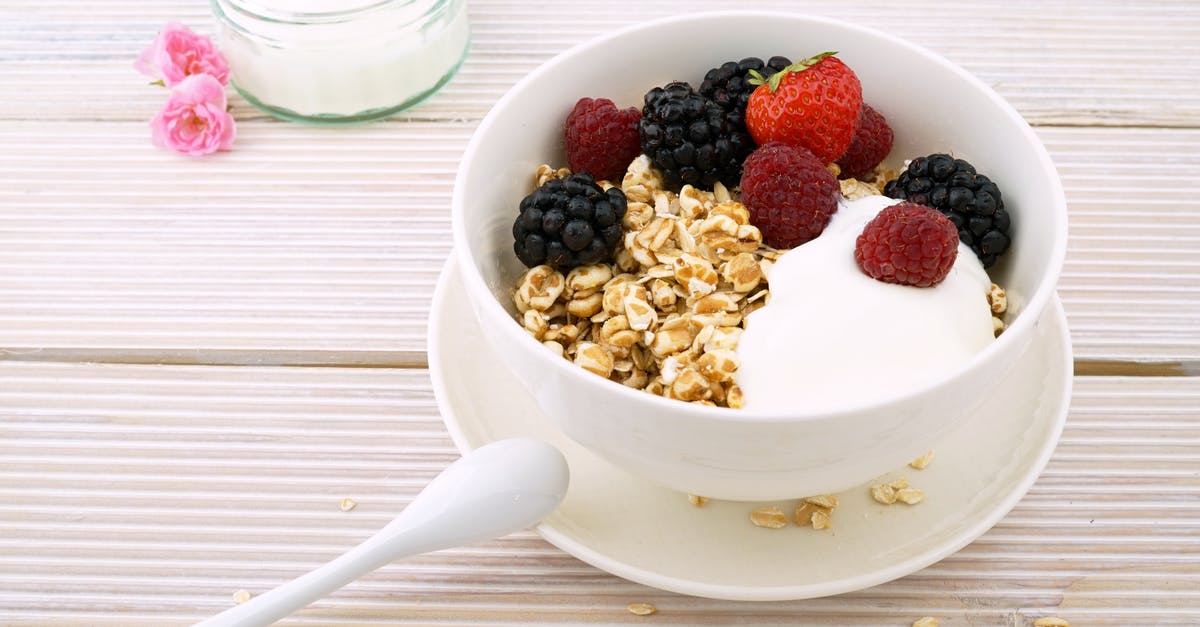 Which emergency food for backpacking (meat-like Granola bar?) - Red Strawberry and Raspberry on White Ceramic Bowl