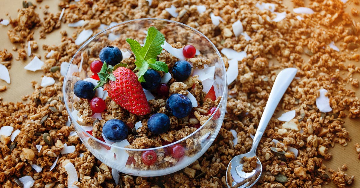 Which emergency food for backpacking (meat-like Granola bar?) - Strawberry And Blueberry On Clear Glass Bowl