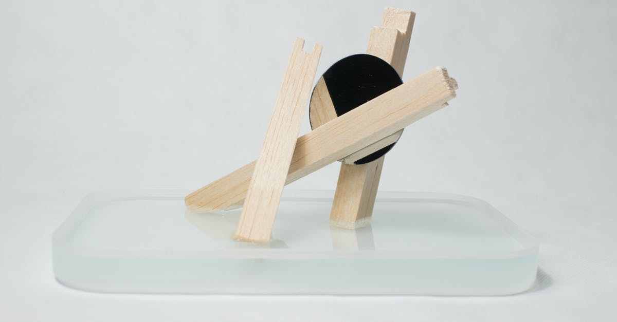 Which Nazca line figure is this? - Wooden artwork on glass stand in studio