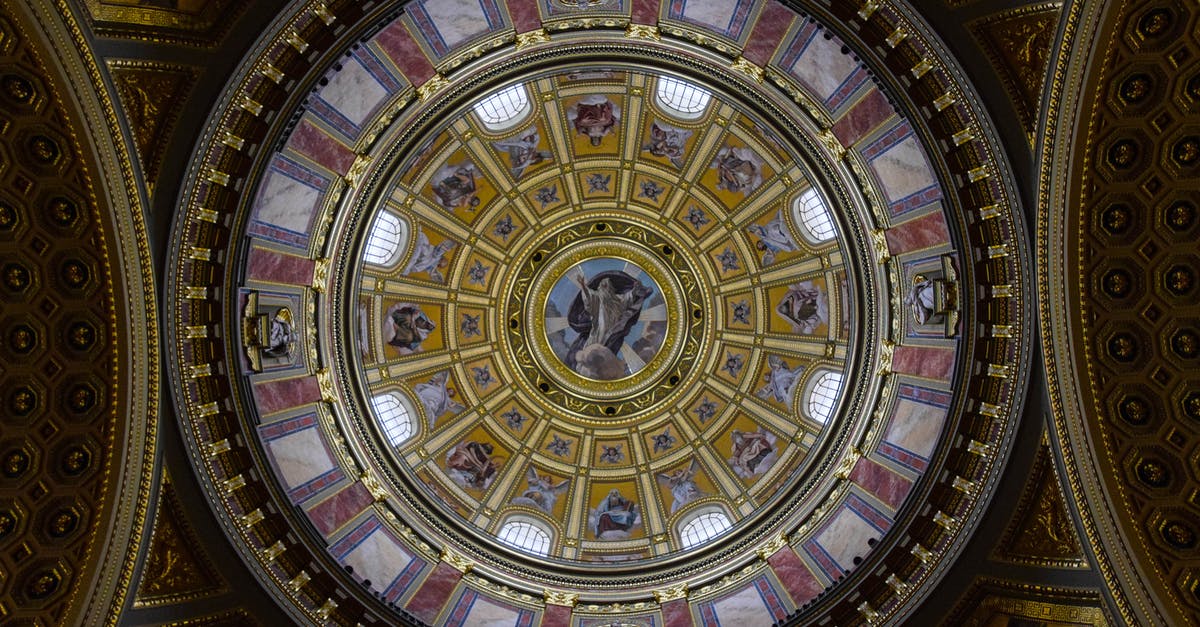 Which options are there to travel from Budapest to Sarajevo by ground? - From below majestic interior ornamental dome of St. Stephen Basilica with religious paintings and mosaic elements located in Budapest