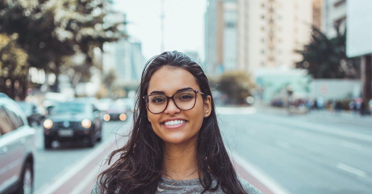 Which to prefer, Reykjavík Cars or Reykjavik Rent-a-car? [closed] - Woman Wearing Black Eyeglasses