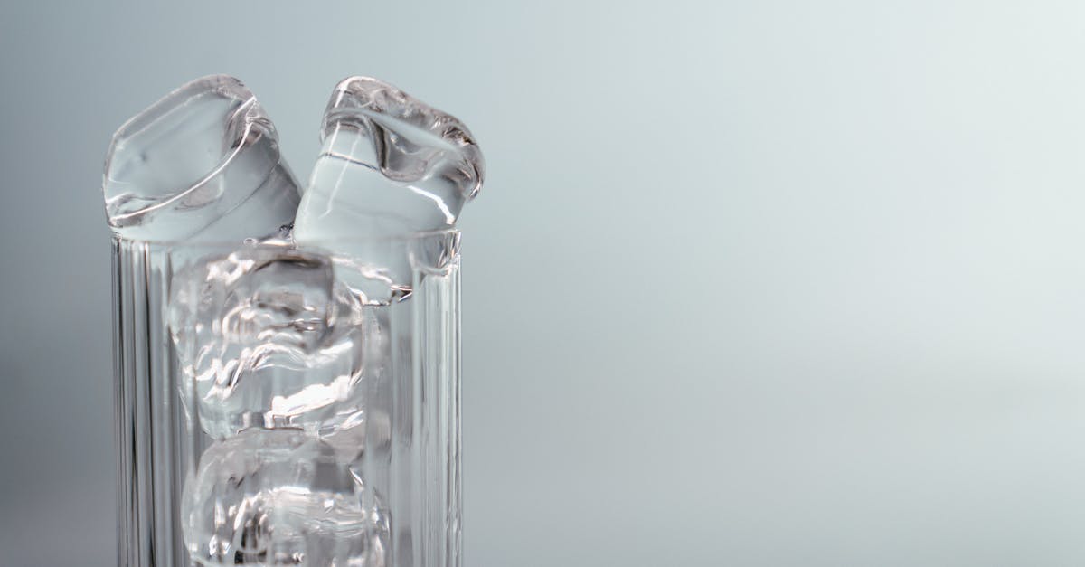 Why are there holes in ice cubes in airplanes? - Clear Glass Bottle With Water