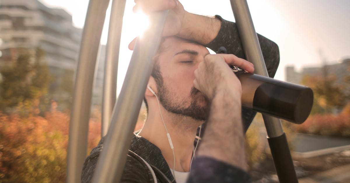 Why are there not more auto piloted trains? [closed] - Tired sportsman man drinking water during training on street