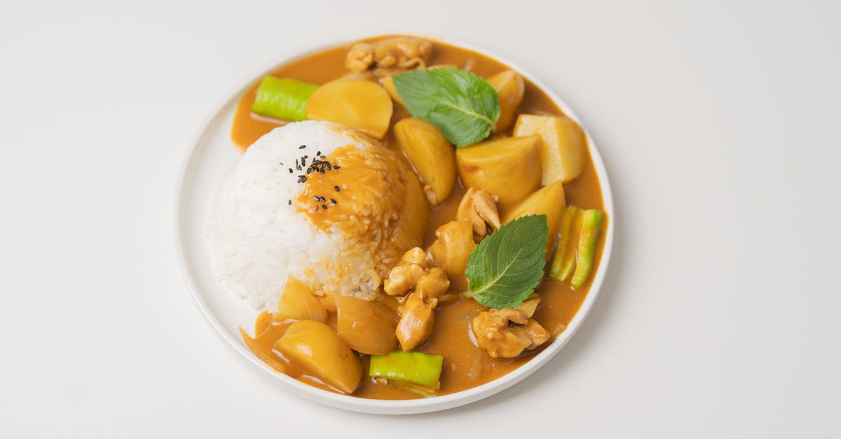 Why do Indian restaurants in India serve food items in every plate, while those in the U.S. simply put it out on the table? - From above of appetizing dish of Indian cuisine curry made of vegetables and meat and served with rice and green leaves Why do Indian restaurants in India serve food items in every plate, while those in the U.S. simply put it out on the table? - From above of appetizing dish of Indian cuisine curry made of vegetables and meat and served with rice and green leaves
