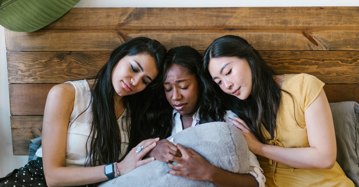 Why do some ferry checkins close so early? - 3 Women Sitting on Brown Wooden Couch