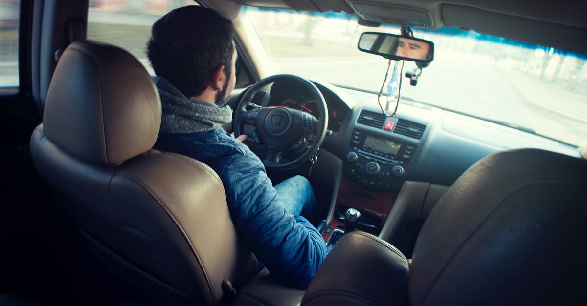 Why do unavailable seats follow me on Delta - Man Wearing Blue Jacket Sitting Inside Car While Driving