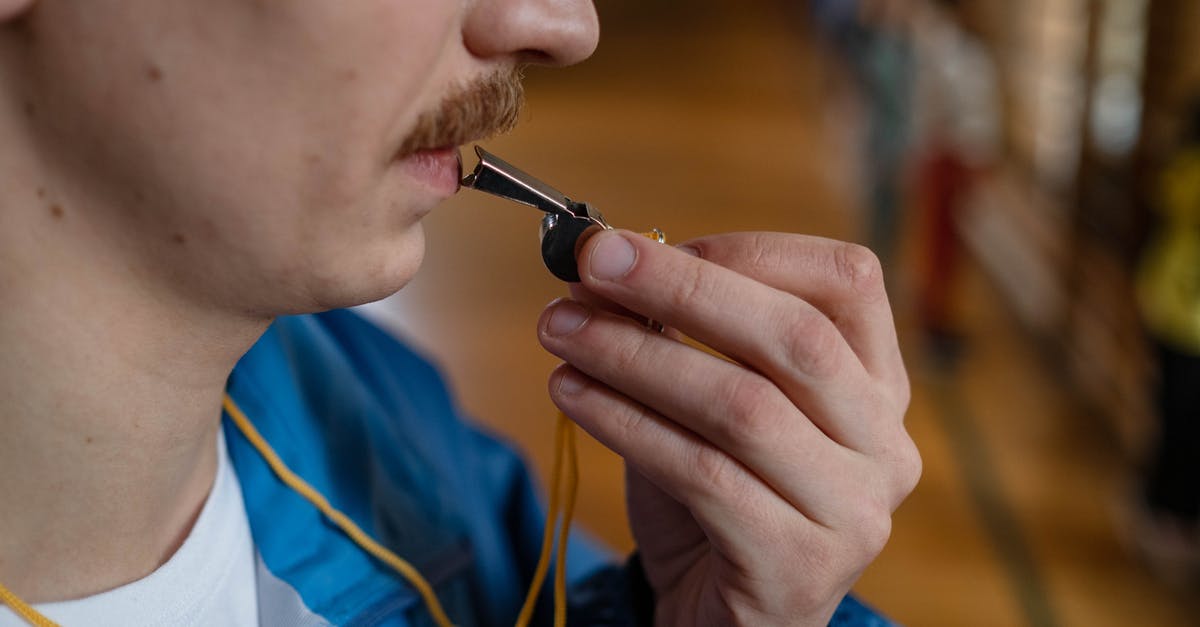 Why is blowing your nose rude in Japan? - Person Ready to Blow a Whistle