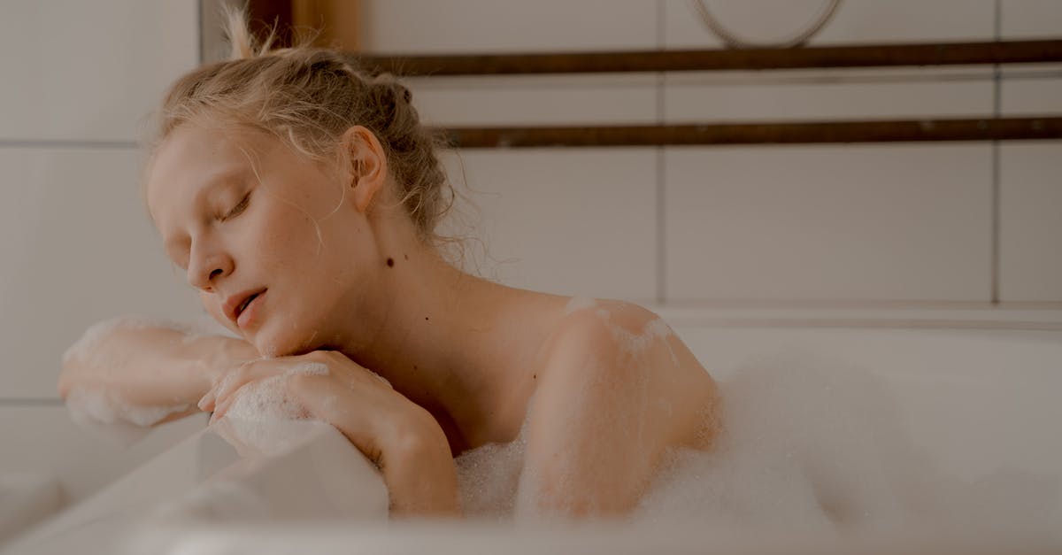 Why is it taking so long to be ticketed? [closed] - Woman with Closed Eyes in Bathtub