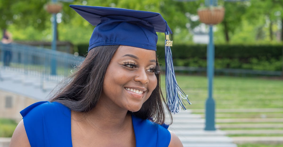 Why was UAL 2013 cancelled Sept 12th 2021? - Woman in Blue Academic Dress Wearing Academic Hat