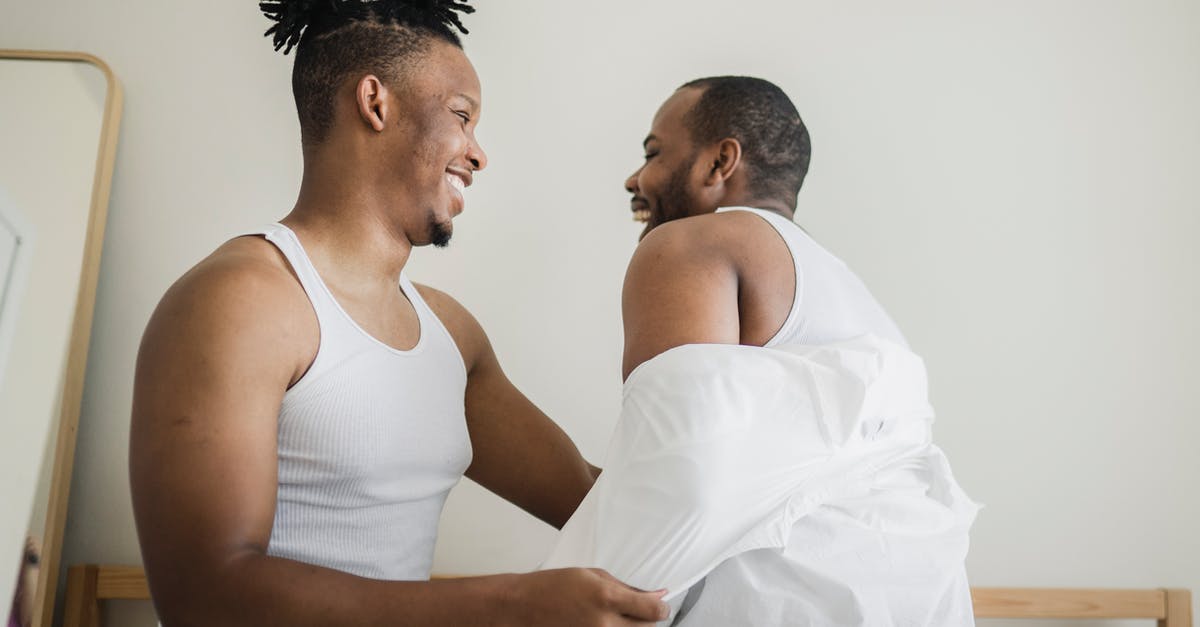 Why would cockroaches and other pests thrive in a hotel? [closed] - Man in White Tank Top Sitting on White Chair