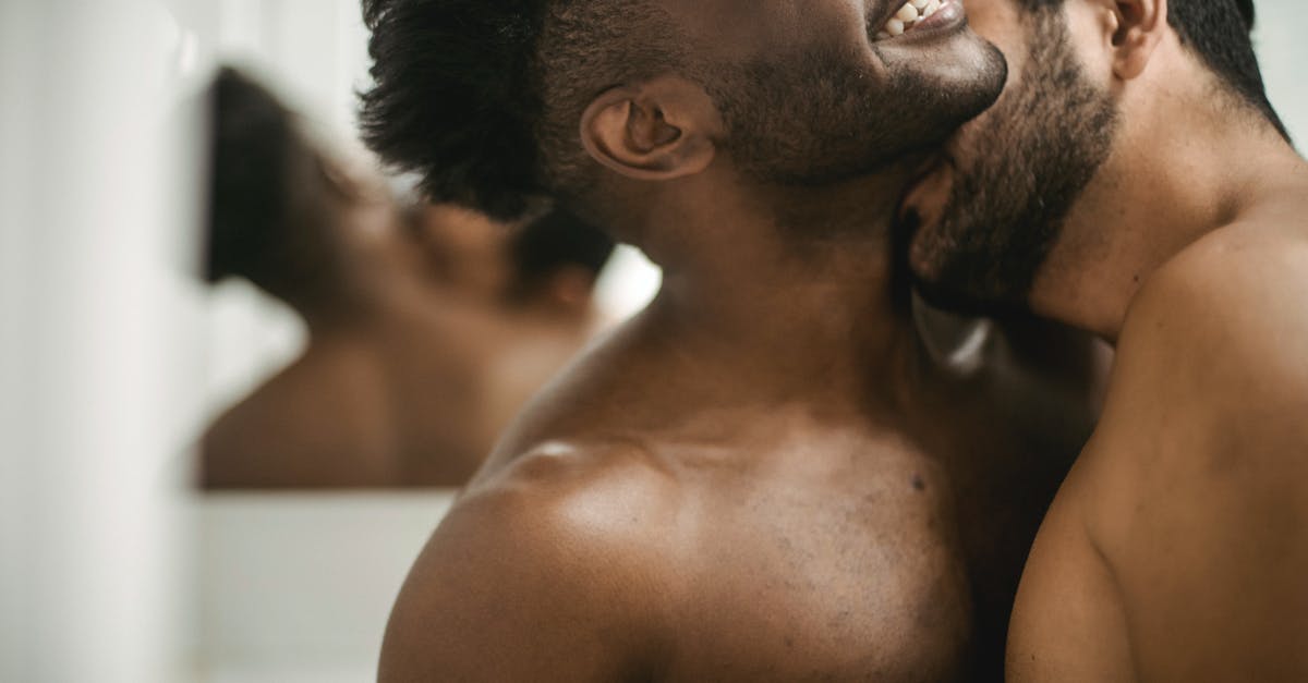 Why would cockroaches and other pests thrive in a hotel? [closed] - Shirtless Man Kissing Other Undressed Man on Neck