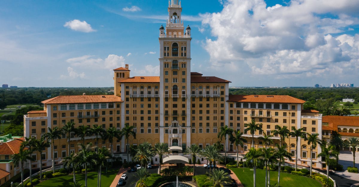 Why would you cancel a non-refundable hotel reservation? - Hotel Building Under Blue Sky