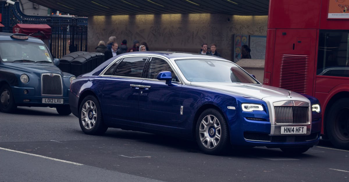 Wifi and power outlets on bus from Paris to Turin - Blue and Silver Rolls Royce Sedan