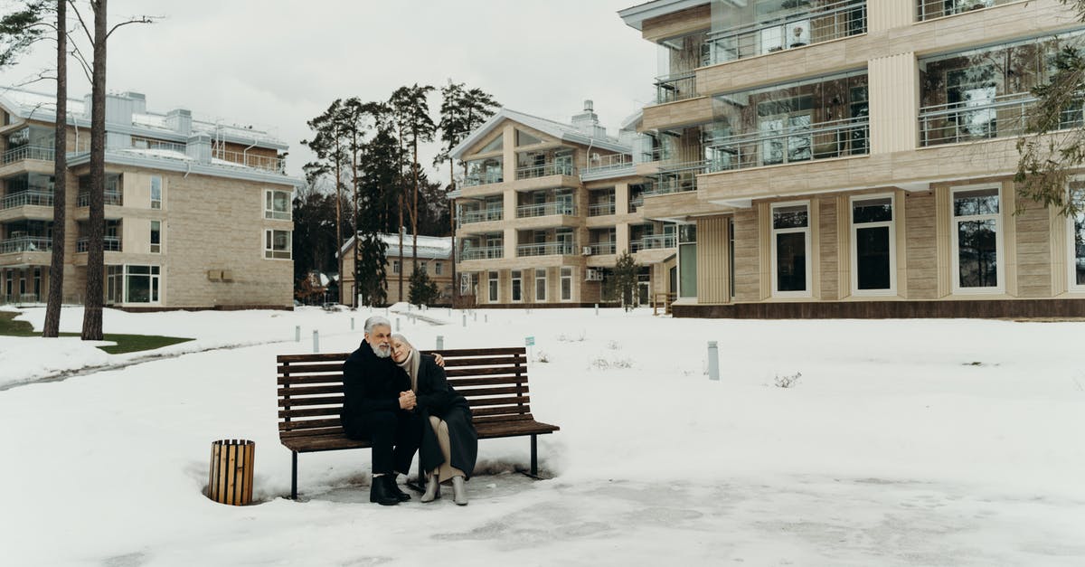 will 10 year old refusals affect current visa application? - Photo of an Elderly Couple Sitting on a Wooden Bench