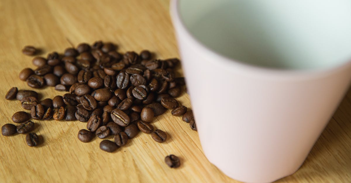 Will Brexit make a difference to my EU/UK NHIC? [closed] - From above of empty mug and coffee beans on wooden table prepared for making coffee