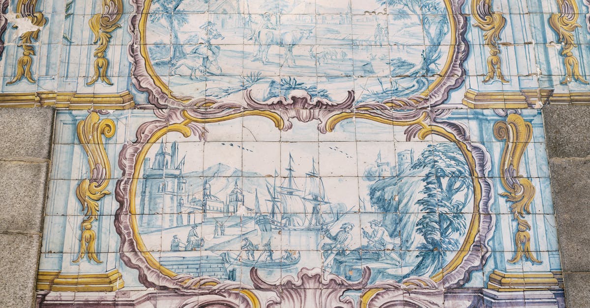 Will I be understood in all Portuguese-speaking countries, if I learn Portuguese in Portugal? - Amazing Azulejo tin glazed ceramic tilework depicting pastoral scene and ship in port on wall of building in Porto city in Portugal