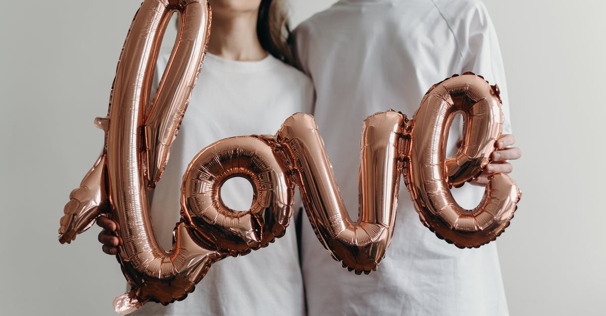 Will I Have Problems with July Air Quality in Seoul? - Woman in White Crew Neck Shirt With Brown and White Heart Shaped Beaded Necklace