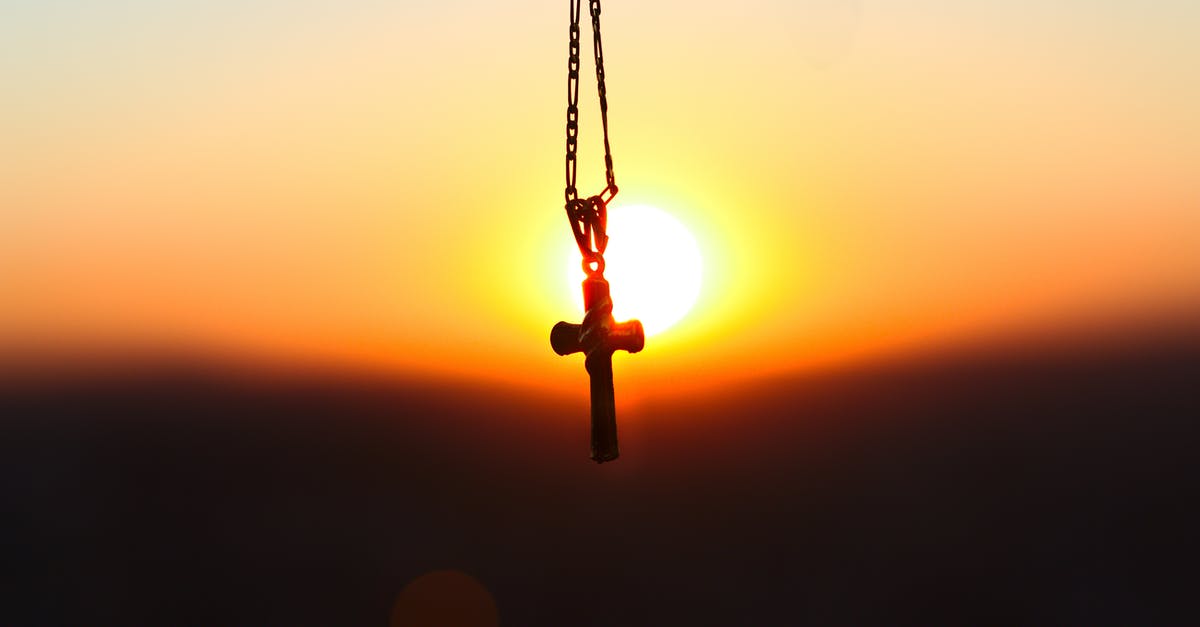 Will it matter if I cross the Russian border 6 hours after my visa expires? - Selective Focus Photography of Cross Pendant