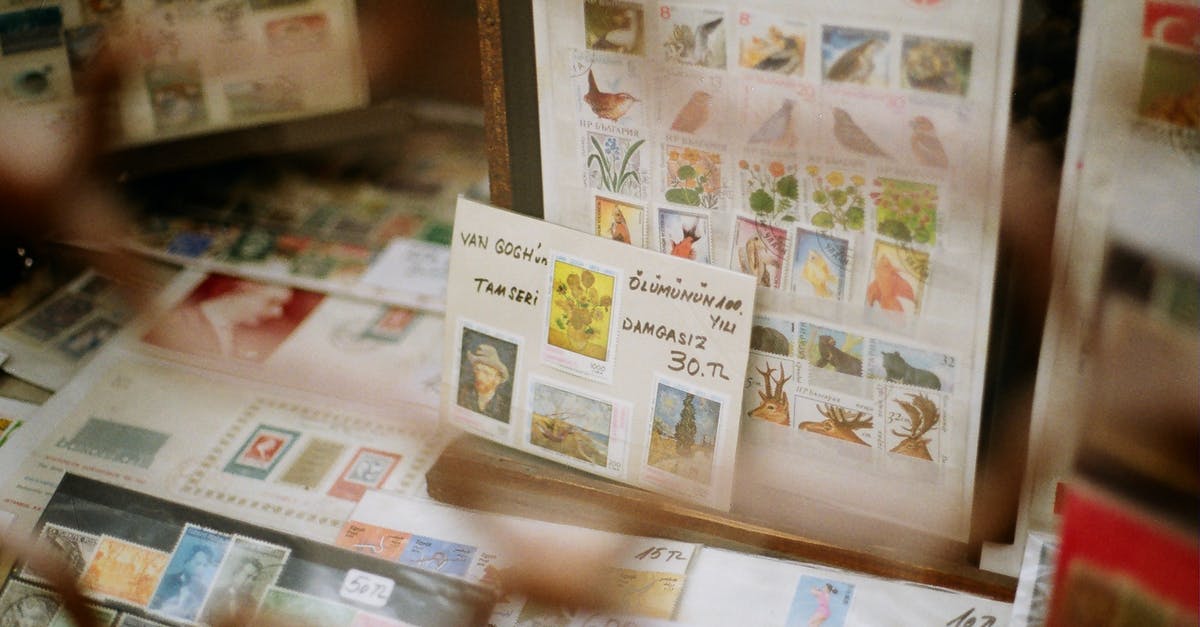 Withhold number when calling local numbers in Vietnam - Showcase with assorted postage stamps with illustrations of birds and artworks for sale in shop