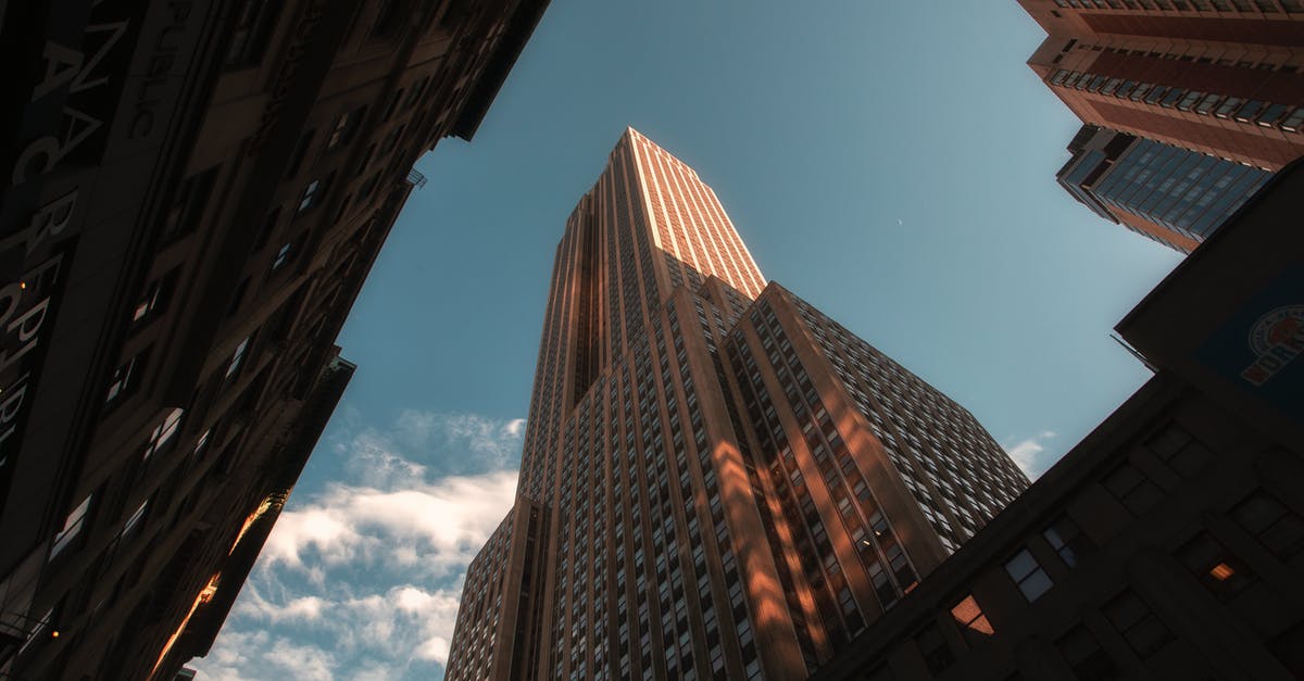 Work as freelancer while tourist in US [duplicate] - Low-Angle Photography of High Rise Buildings Under Blue Sky