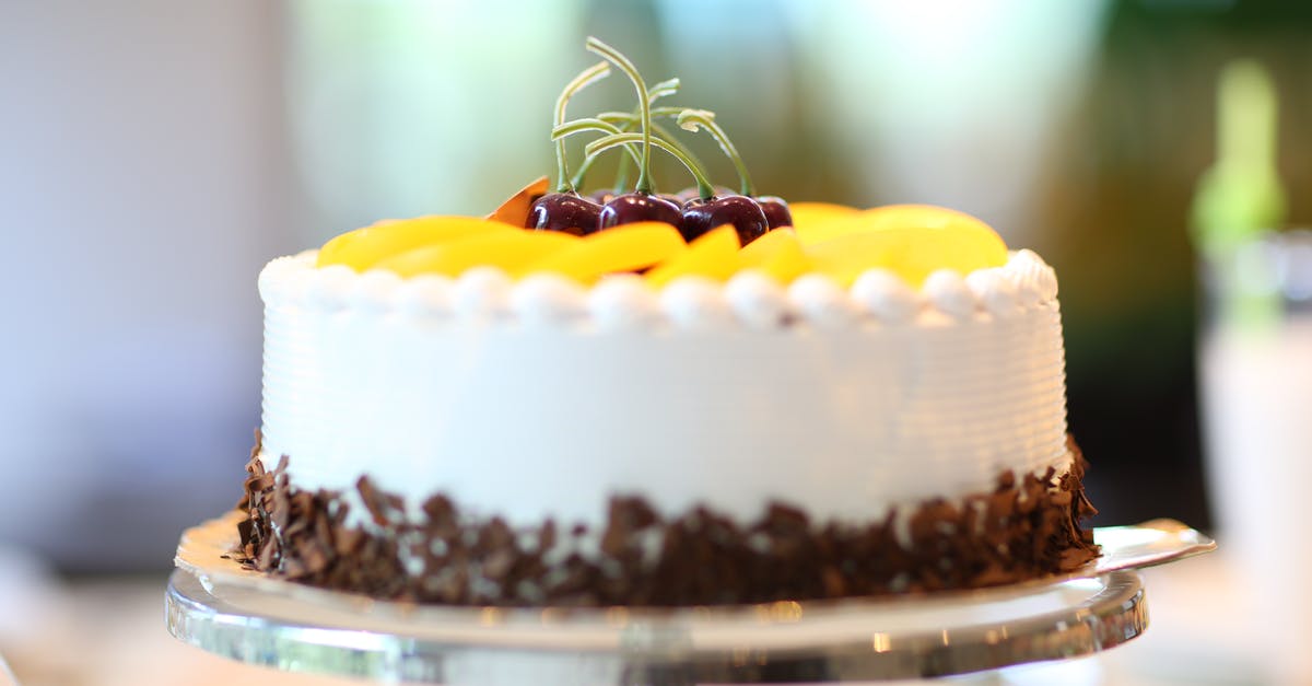 Would chocolate liqueur cherries be allowed through Australian customs? [duplicate] - White Round Cake Topped With Yellow Slice Fruit