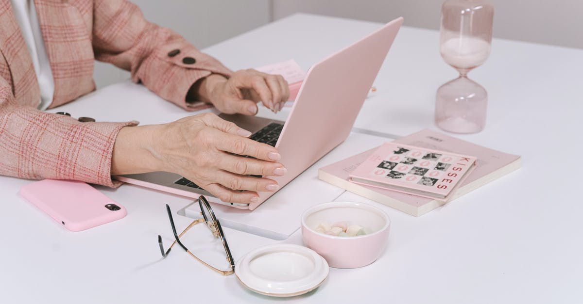 Would Ryanair tolerate a 15.6" laptop case as a second hand luggage? - Person Using a Macbook with Pink Case Would Ryanair tolerate a 15.6" laptop case as a second hand luggage? - Person Using a Macbook with Pink Case