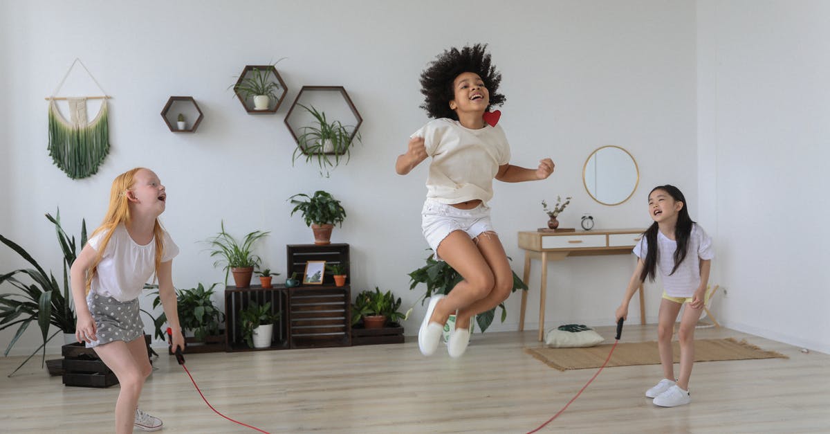 Would Transavia cancel my itinerary if I skip the outbound flight? - Black girl jumping over rope while playing with friends