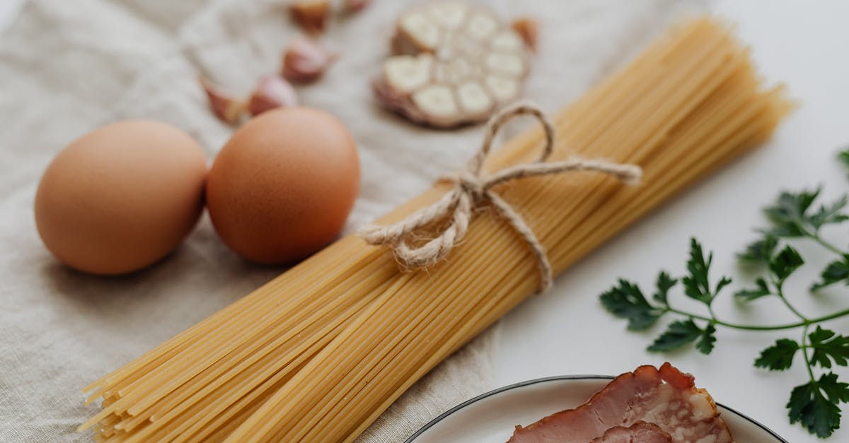 Would uncooked bacon go bad in a transatlantic flight? - Photo Of Pasta Beside Egg